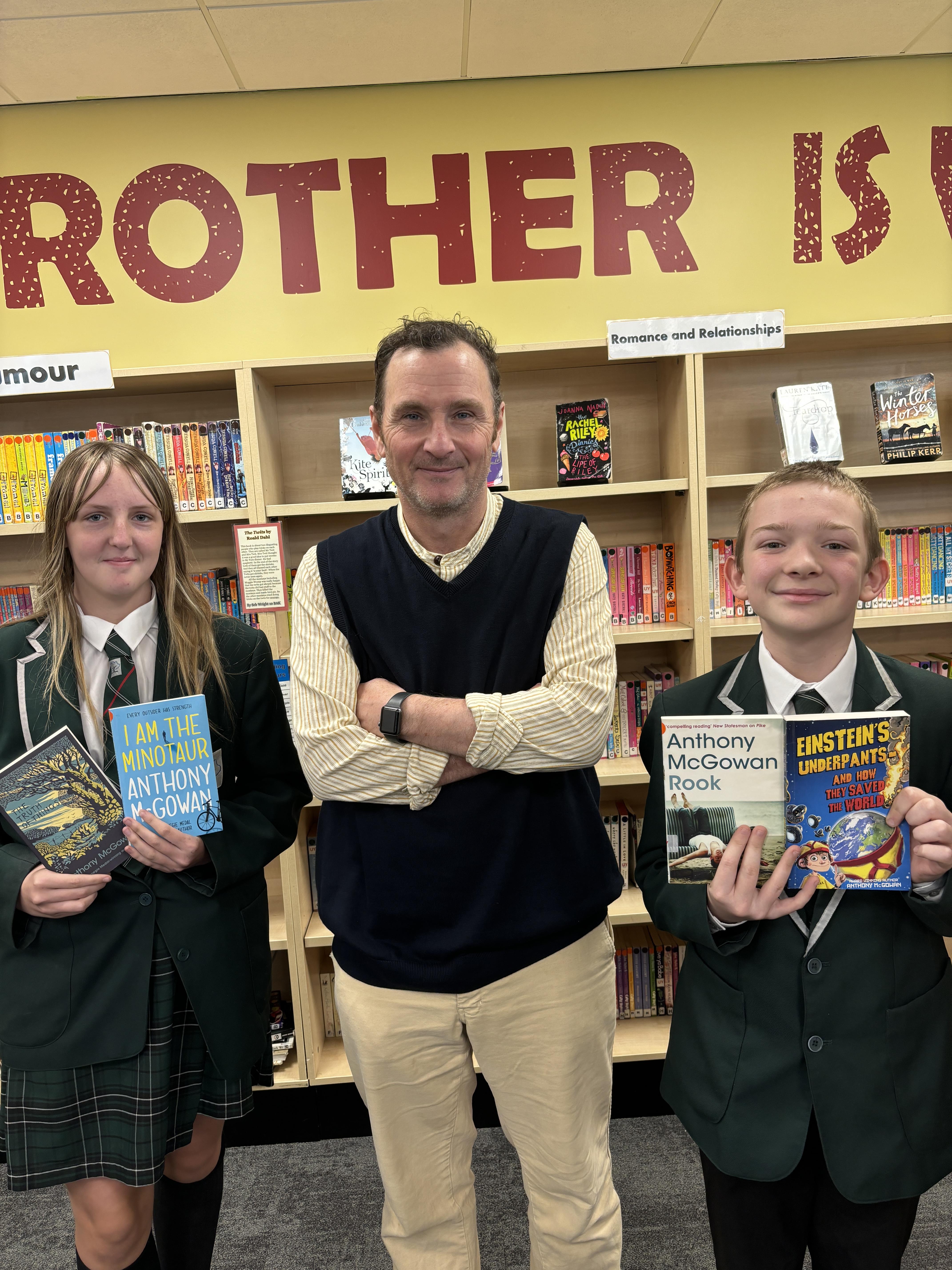 Anthony McGowan with Stockport Academy students