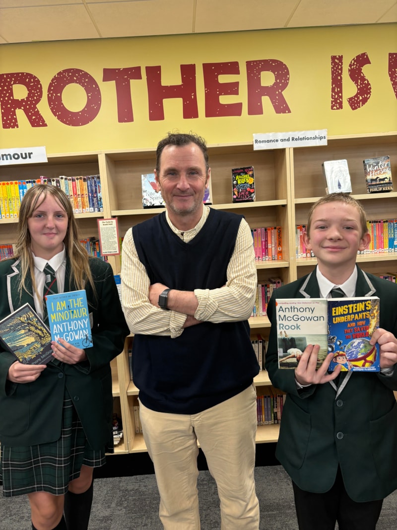 Anthony McGowan with Stockport Academy students